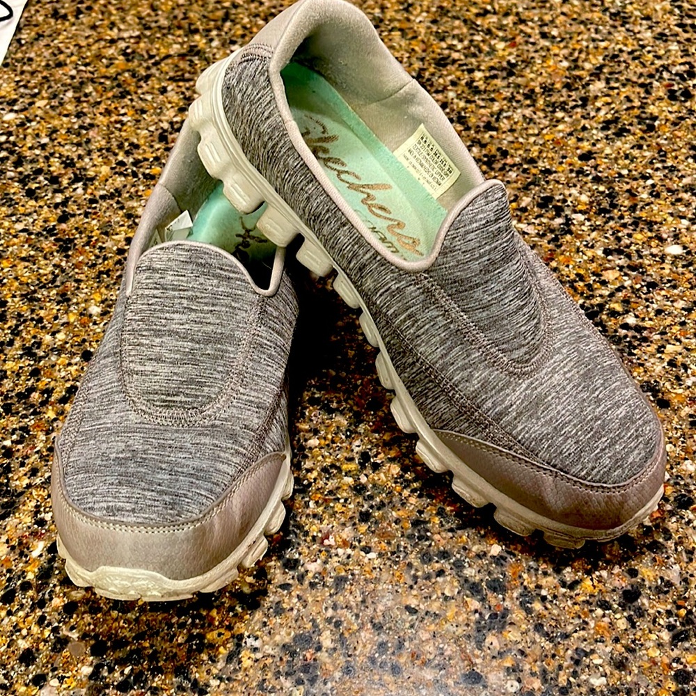 Gray Skechers shoes.  Gently used.  Size 8.5.
